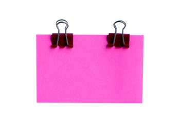 pink sticky note with binder clip on white background isolated