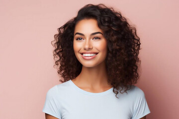 Smiling young woman with implanted teeth on light background - obrazy, fototapety, plakaty