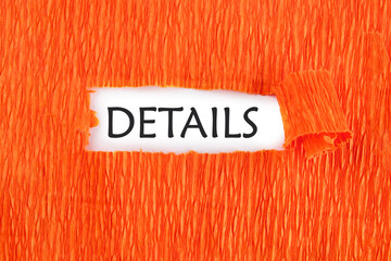 DETAILS the text under the torn paper is orange on a white background