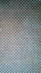 Abstract photograph with texture of stainless steel sheet, steel plate, non-slip used in industrial plants. Anti-slip stainless steel sheet Non-Slip Bottom Steel Plate
