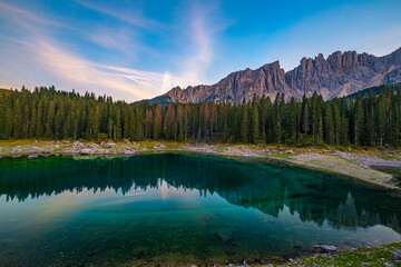 Lago di Carezza's, A beloved destination in South Tyrol and the Dolomites. Explore the guide for essential tips on savoring this picturesque gem