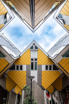 Rotterdam, Netherlands - July 28, 2023: Cube houses are an architectural ensemble of thirty-eight cubic houses located over Blaak street, designed by dutch architect Piet Blom and built in 1984.