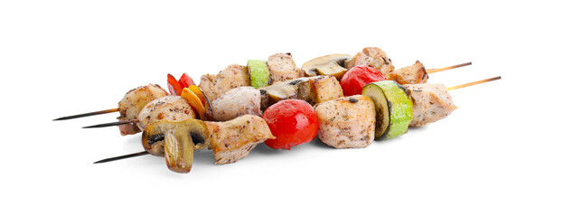 Delicious shish kebabs and grilled vegetables isolated on white