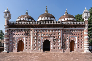 Fototapeta na wymiar Front view of ancient landmark Nayabad mosque on a sunny morning, Kaharole, Dinajpur, Bangladesh
