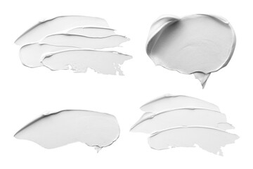 Oil paint strokes isolated on white, top view