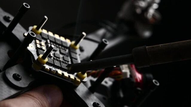 Process Of Soldering Connections On Microchip Of Fpv Drone