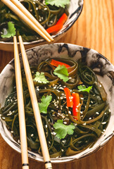 Various types of  seaweed, algae salad: dried nori, kombu, waakame. Japanese base. Traditions of...