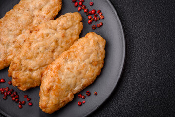 Delicious fresh fried minced fish or chicken cutlets with spices and herbs