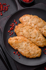 Delicious fresh fried minced fish or chicken cutlets with spices and herbs