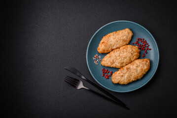 Delicious fresh fried minced fish or chicken cutlets with spices and herbs