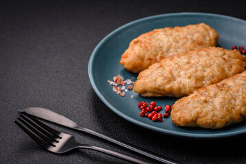 Delicious fresh fried minced fish or chicken cutlets with spices and herbs