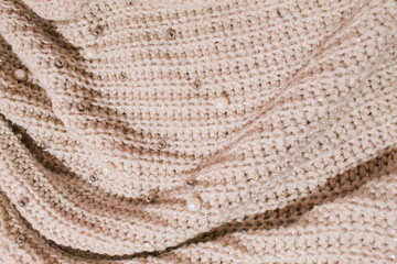 Wool texture beige color with details. Close up, Retro stile