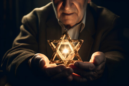 old man with a star of david in his hands
