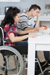 young disabled female surfing on web