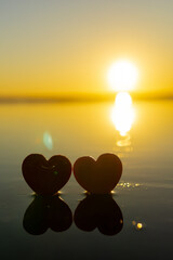 夕日の砂浜のとハート