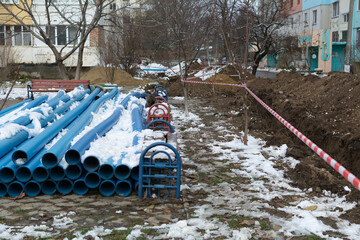 Blue Plumbing pipes. Plastic polypropylene pipe. Sanitary, sewer drainage system for a multi-story...