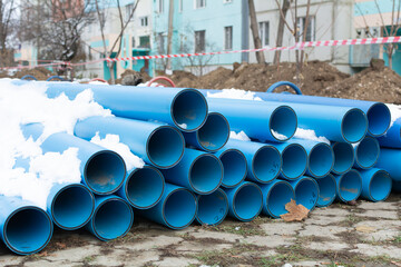 Blue Plumbing pipes. Plastic polypropylene pipe. Sanitary, sewer drainage system for a multi-story...