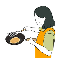 パンケーキを作る女性