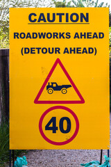 Road Sign Words Caution Trucks Yellow Graphics  - 692998531