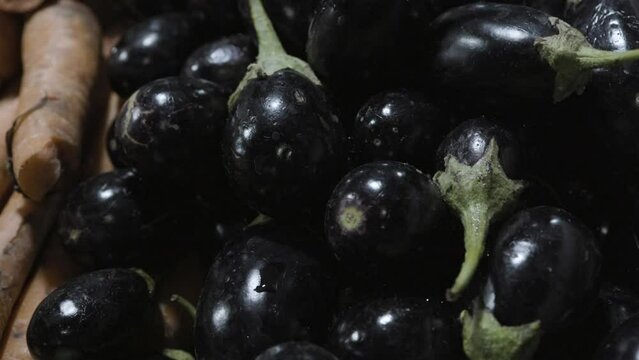 fresh brinjal at vegetable store for sale at evening