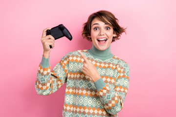 Photo of wearing pullover print pullover fall season gaming vibe pointing finger gamepad fortnite sale isolated on pink color background