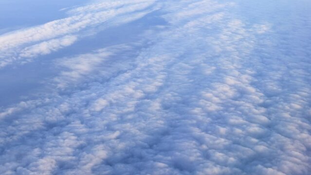 Thick clouds. View from the window of an airplane. Real time