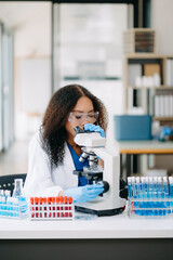 Modern medical research laboratory. female scientist working with micro pipettes analyzing biochemical samples, advanced science - obrazy, fototapety, plakaty