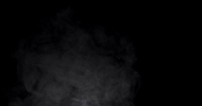 Natural white smoke on a black background