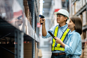 Warehouse staff working together using digital tablets to check the stock inventory on shelves in large warehouses, smart warehouse management system, supply chain, logistic network technology concept