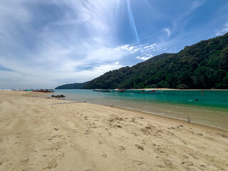Kho Surin Island Coral reef teaming with reef fish of various colours. the Andaman Sea in  Thailand teaming beautiful lush green mountains and turquoise blue waters white sandy beaches