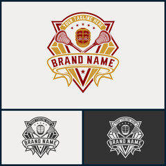 Obraz premium Lacrosse logo. Lacrosse helmet and stick, Lacrosse sport team design