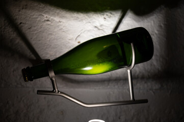 Sediment in bottle. Production of cremant sparkling wine in south part of Luxembourg country on...