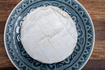French soft Camembert cheese, original Camembert de Normandie, with white mold
