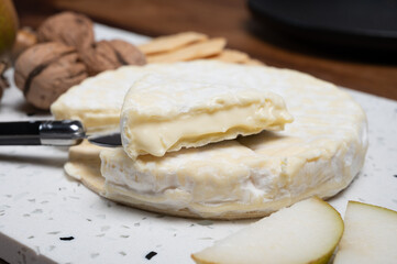 French soft Cremeux de Normandie cheese, soft creamy cheese with white mold