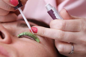Eyelash care procedures.Lamination of eyelashes. The concept of beauty.Care:lifting and curling,...