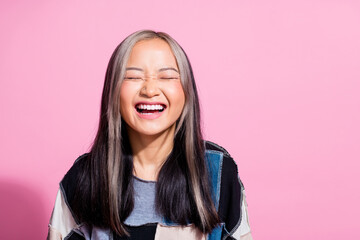 Portrait of cheerful adorable girl closed eyes beaming smile have good mood empty space isolated on...