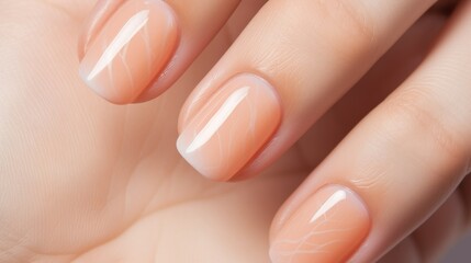 Elegant Manicured Female Hand Close-up. Close-up view of a womans hand with elegant nude Peach Fuzz manicure, showcasing clean beauty and nail care.