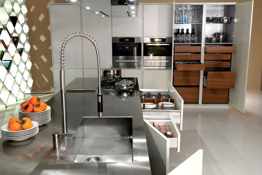 Sink and faucet in modern kitchen interior, minimal style