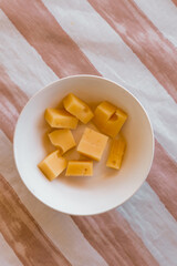 Bowl of chopped cheese. Food concept