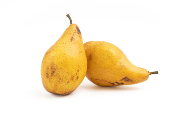 Two yellow pears on a white background close-up