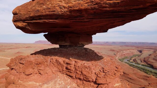 Aerial shot of the amazing balancing rock formation of Mexican Hat in Southern Utah