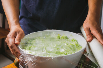 quick pickling process, wrapping with plastic wrap sweet pickle relish ingredients before...