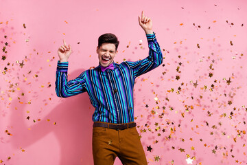 Photo of crazy elegant person have good mood point fingers dance flying confetti isolated on pink...