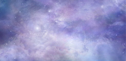 Beautiful heavenly celestial cloudscape background banner - heavenly  concept blue pink purple lilac ethereal deep space sky depicting the heavens above and a nebula ideal for spiritual theme
