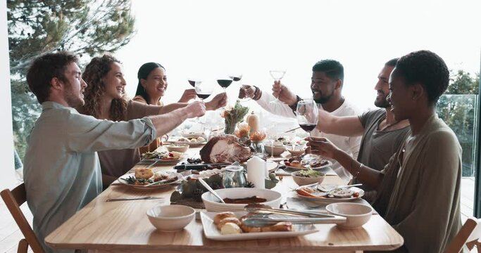 Friends, red wine and toast for holiday celebration, Christmas lunch and success at dining room table. Happy people with alcohol, glasses and cheers for reunion or thanksgiving party and food at home