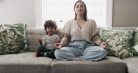 Child, yoga or mother in home for meditation, breathing or spiritual wellness on couch for zen peace. Mom, lotus or parent on sofa in calm pose with kid for mindfulness or awareness to relax together