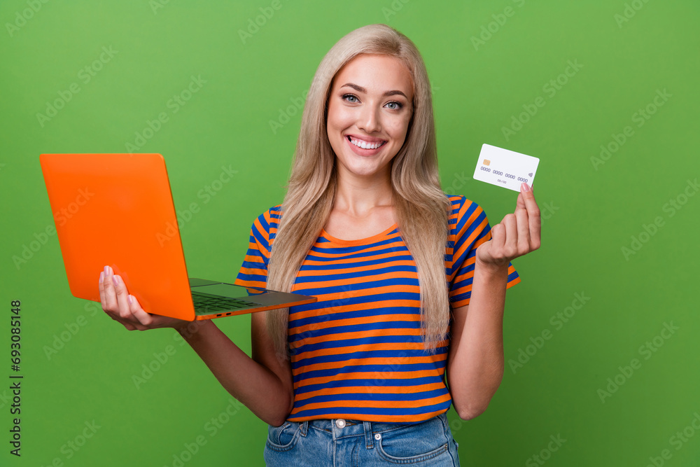 Sticker photo of successful adorable girl wear striped trendy clothes hold plastic bank card cashless paymen