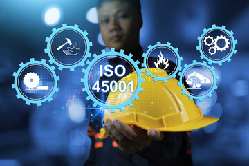 iso 45001 safety standard workplace concept with engineer holding yellow helmet to encourage...