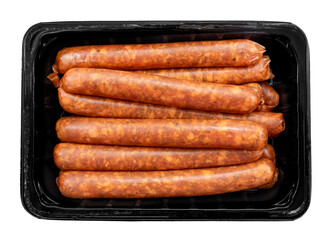 Raw barbecue sausages on a white background in a black plastic box. Pork sausage isolate