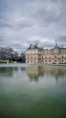 Fototapeta na wymiar PARIS - March 11, 2023: Tourists relax in Luxembourg Gardens in Paris, France. Luxembourg area is popular among tourists in Paris, the most visited city worldwide.